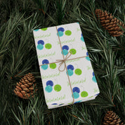 Fa La La La La! Wrapping Paper | Blue & Lime Watercolor Christmas Gift Wrap – wrapped gift tied with twine on evergreen branches with pinecones