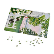 New England Hydrangea Jigsaw Puzzle by Laura Trevey, watercolor jigsaw puzzle partly assembled with loose pieces