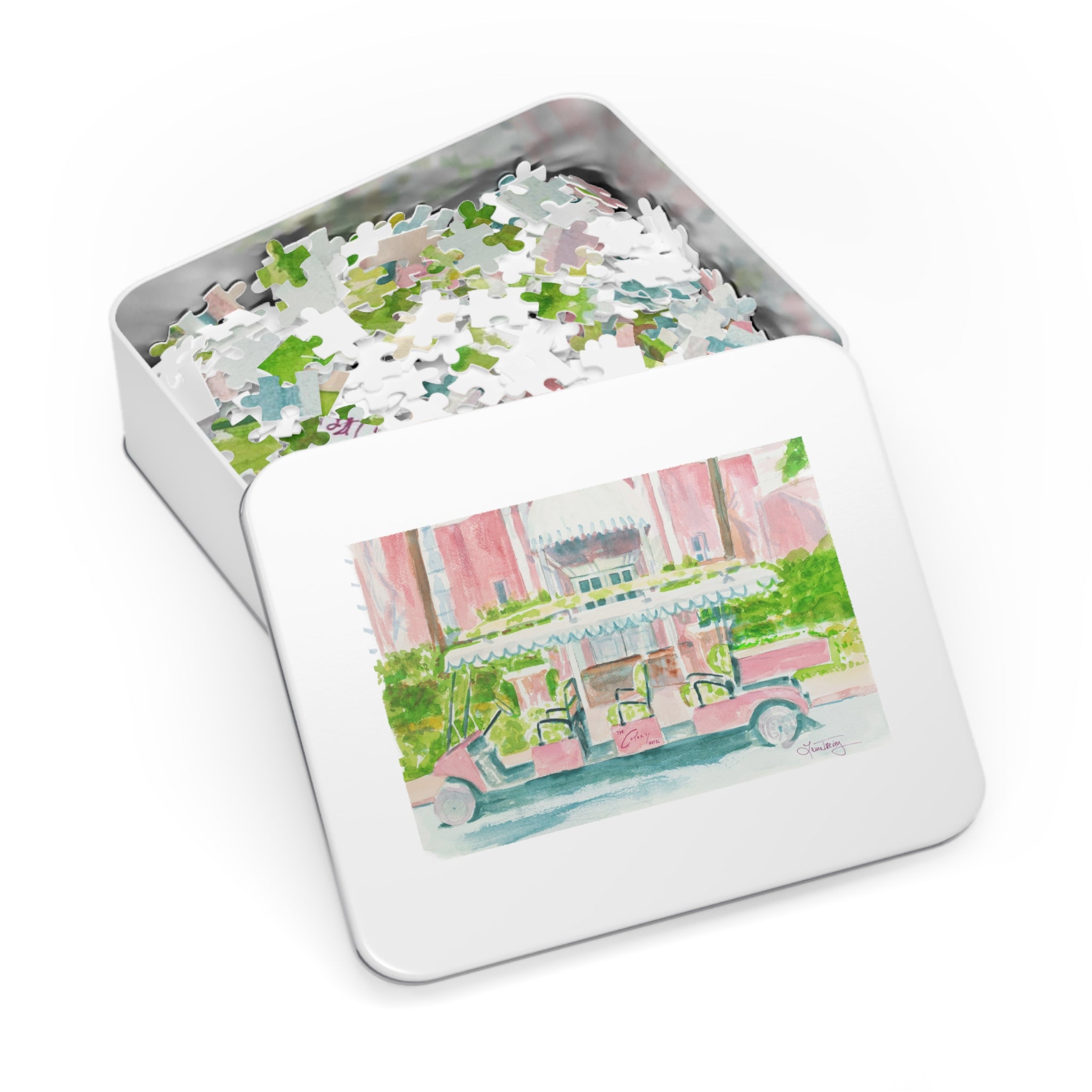The Colony Hotel Jigsaw Puzzle by Laura Trevey, watercolor jigsaw puzzle in white metal gift tin with painting on the lid