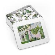 New England Hydrangea Jigsaw Puzzle by Laura Trevey, white metal puzzle gift tin with hydrangea watercolor lid