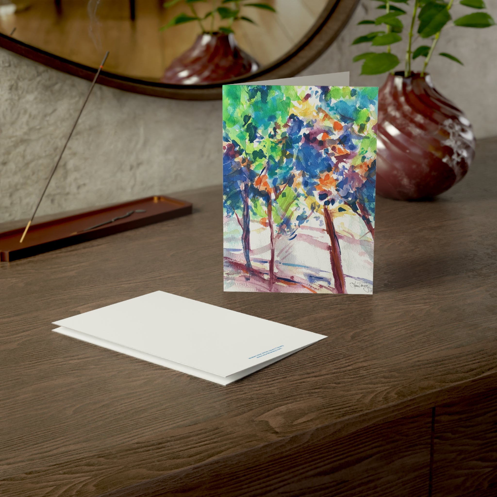 Fall Colorful Leaves watercolor greeting card, on a wooden dresser with envelope
