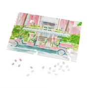 The Colony Hotel Jigsaw Puzzle by Laura Trevey, watercolor jigsaw puzzle partly assembled with loose pieces