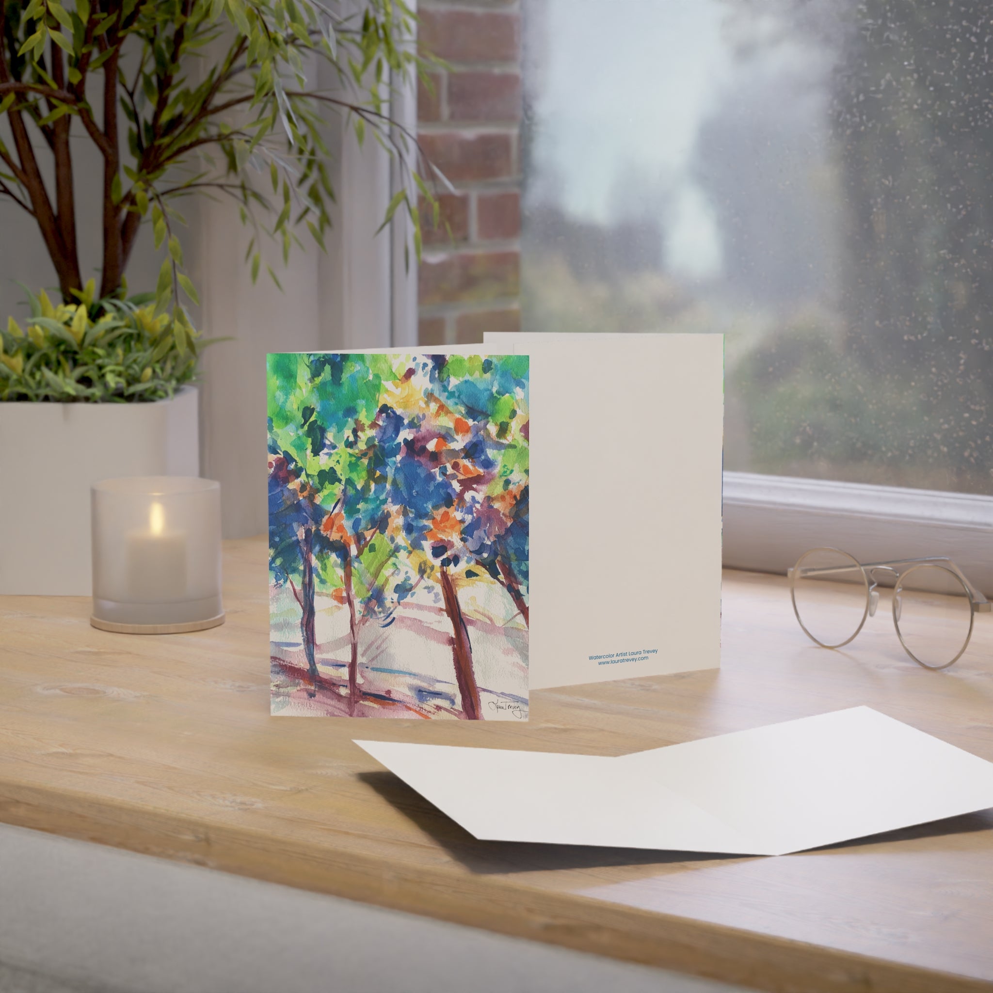 Fall Colorful Leaves watercolor greeting card, standing on a windowsill desk with envelope