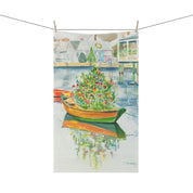 Christmas on Nantucket Tea Towel by Laura Trevey, tea towel clipped to a line with clothespins