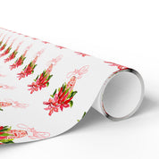 Poinsettia wrapping paper with red watercolor poinsettias on white by Laura Trevey, roll unrolled to show the design up close