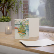 Christmas on Nantucket watercolor greeting card, standing on a windowsill desk with envelope
