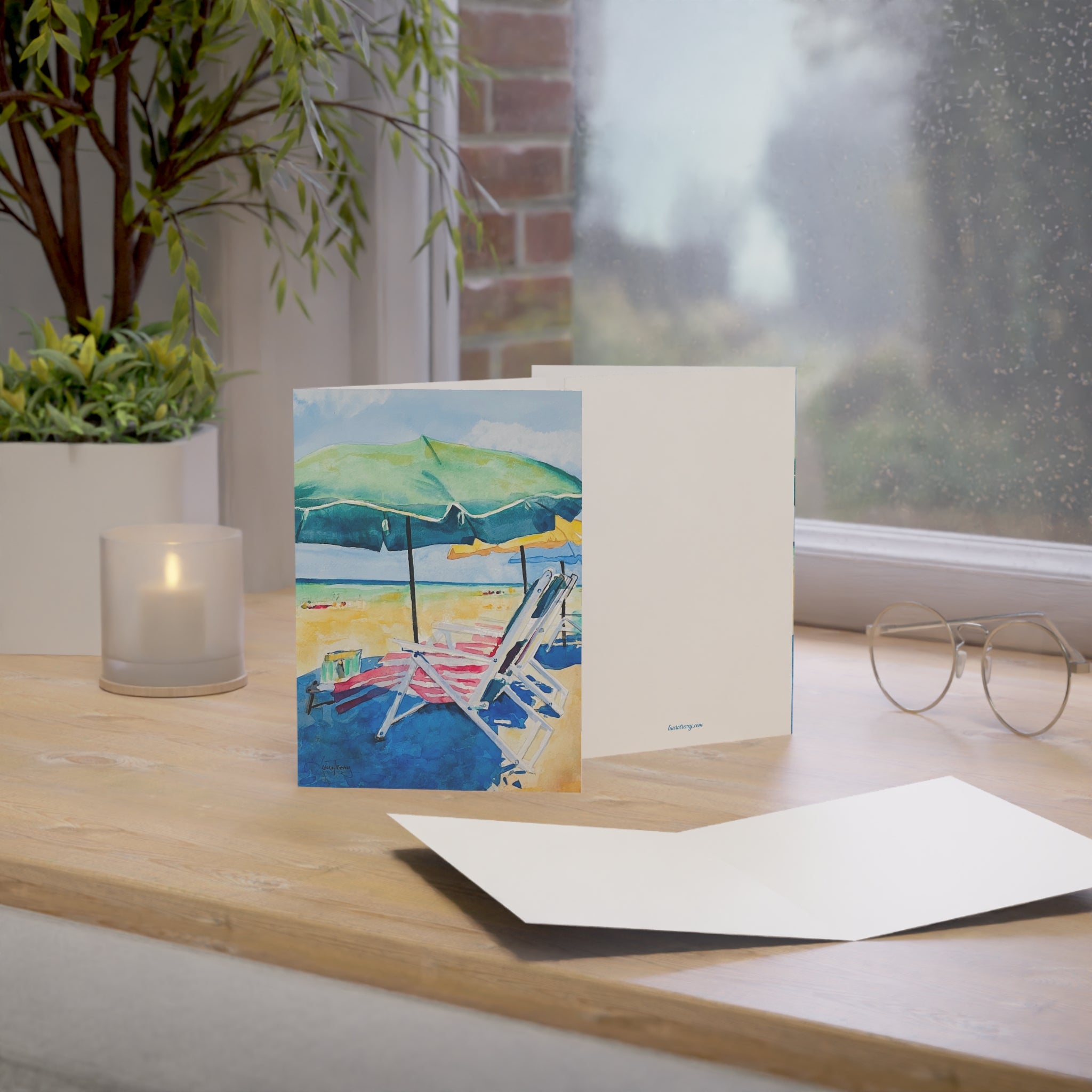 Beach Days watercolor greeting card, standing on a windowsill desk with envelope