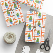 Citrus orange tree wrapping paper with watercolor orange trees in blue and white chinoiserie pots and Coastal Christmas script by Laura Trevey, gifts wrapped with string and gift tags