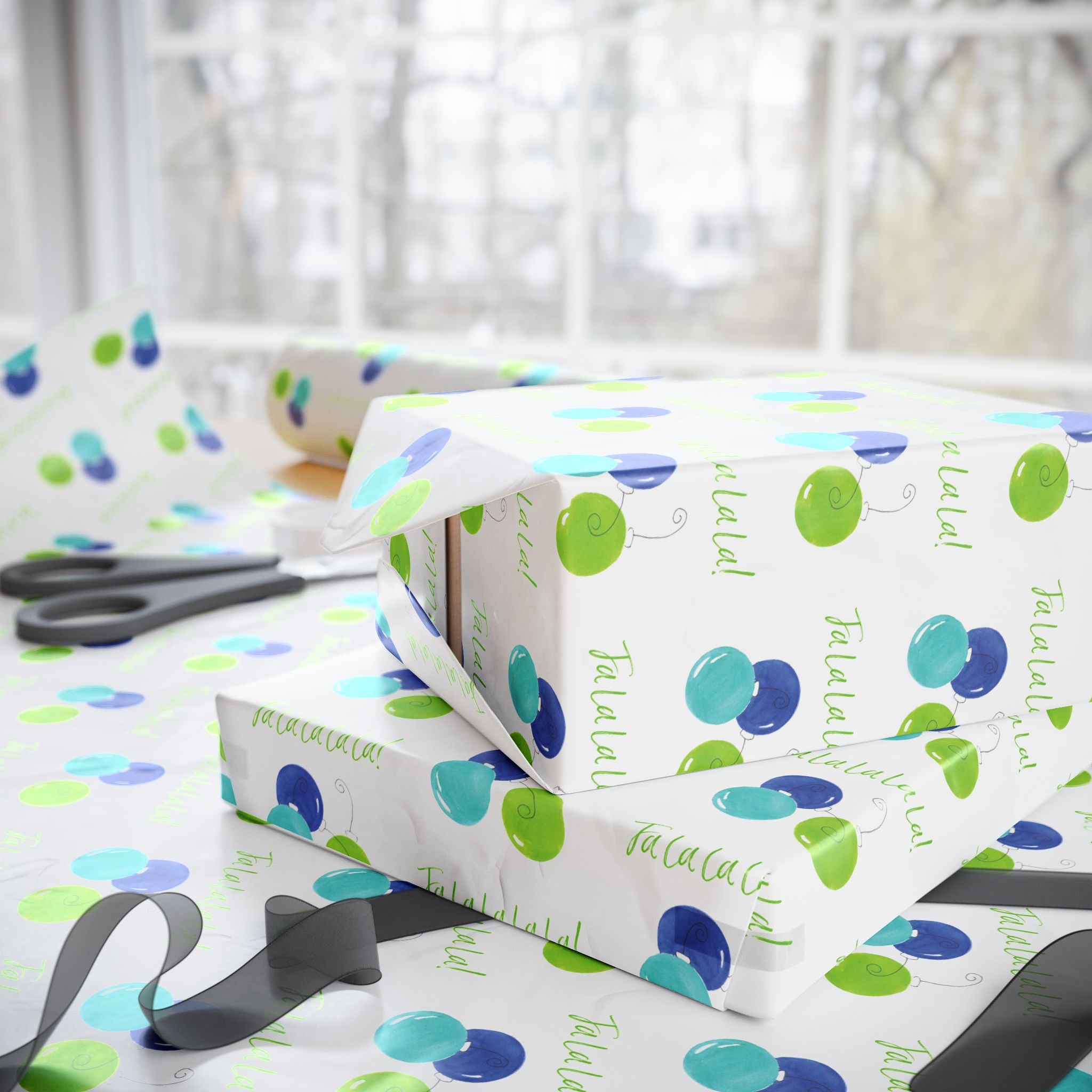 Fa La La La La! Wrapping Paper | Blue & Lime Watercolor Christmas Gift Wrap – stacked gifts and gift wrap with black ribbon in a bright holiday wrapping scene