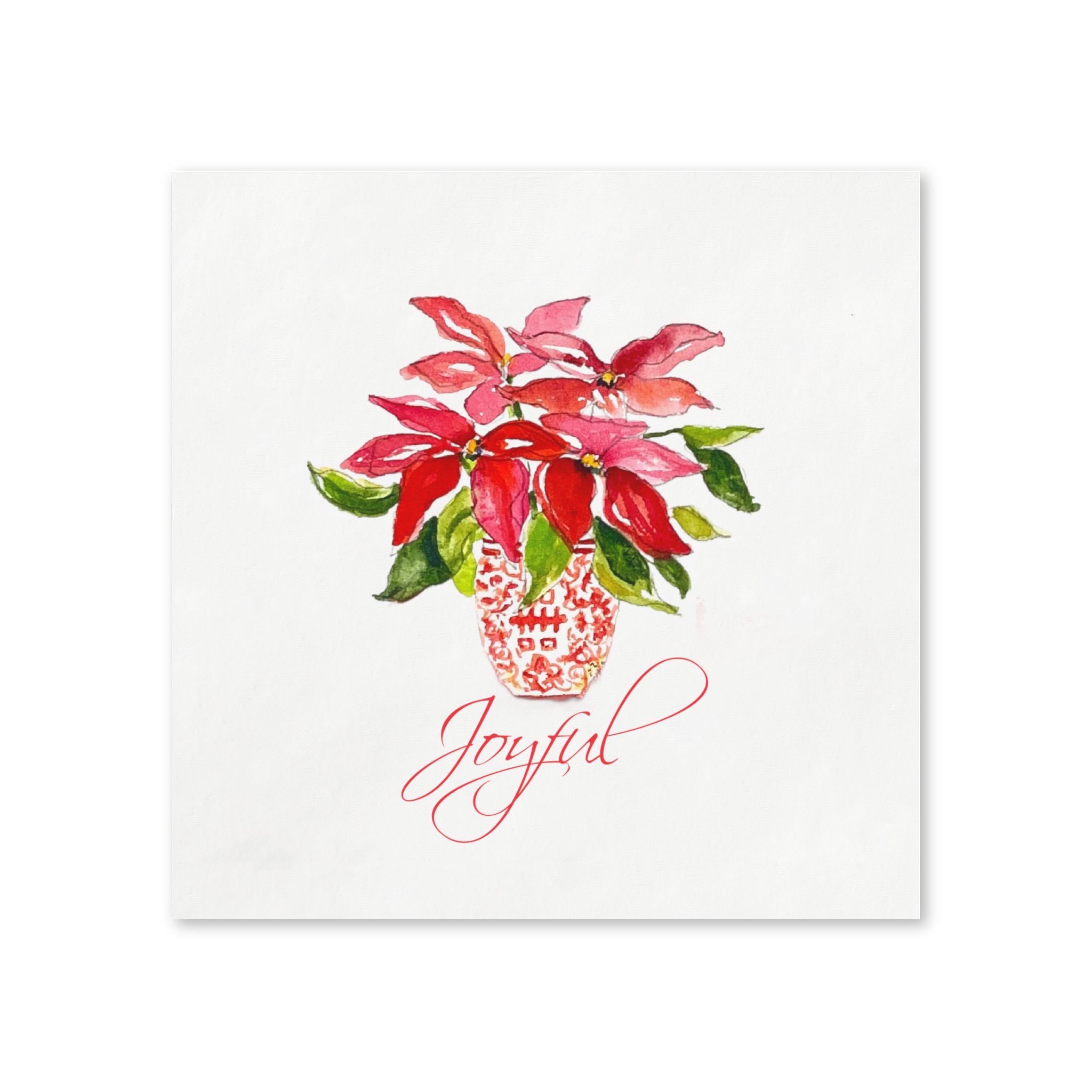 Joyful poinsettia paper napkin flat lay with Joyful in red script, watercolor holiday design by Laura Trevey