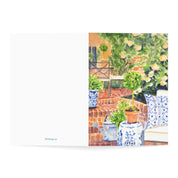 Backyard Oasis watercolor greeting card, opened flat showing front and back cover