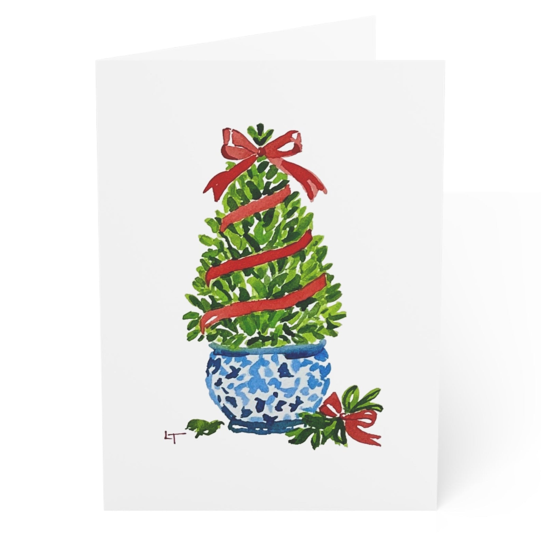 Boxwood Christmas topiary with red ribbon in blue and white chinoiserie pot watercolor Christmas card, front, blank inside, by Laura Trevey