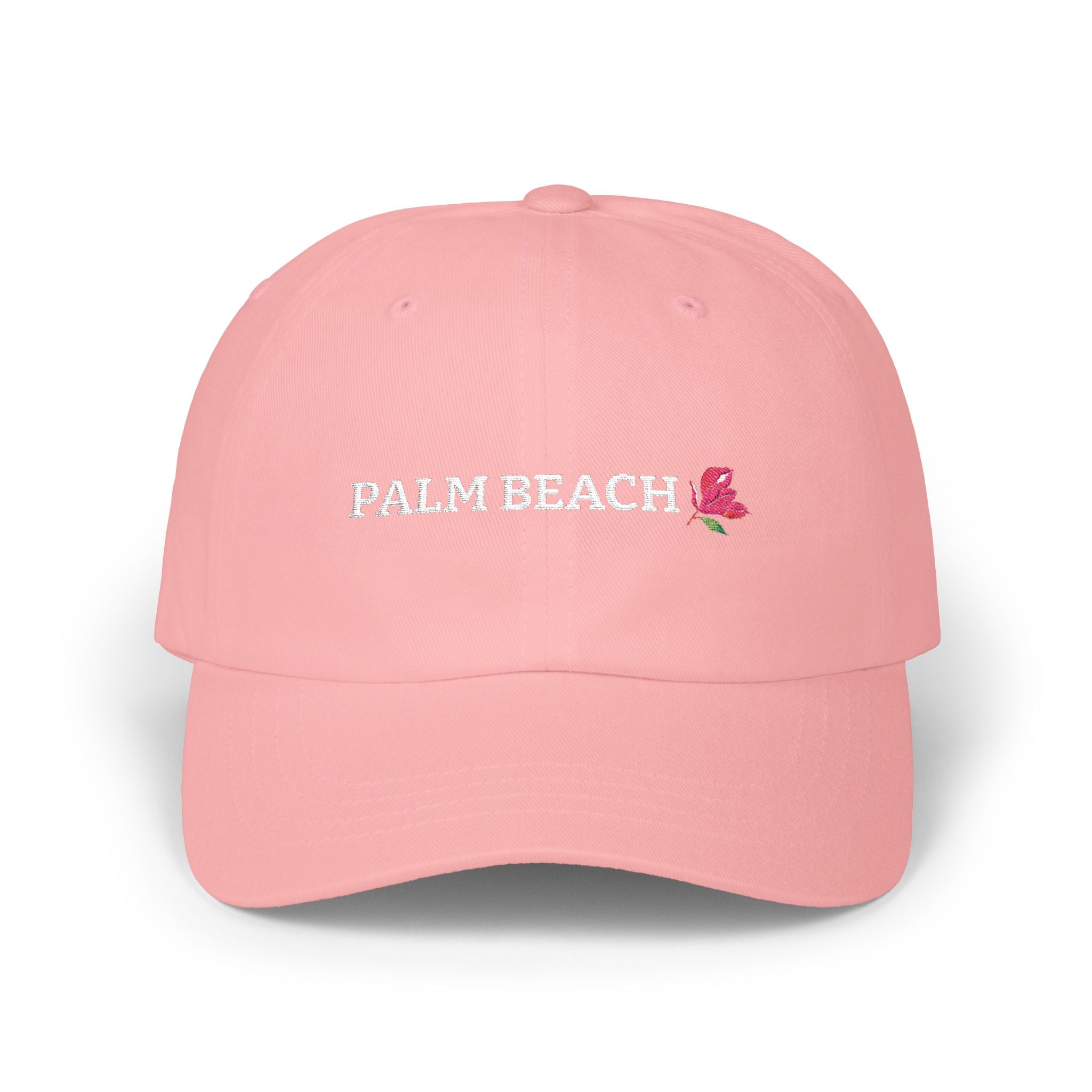 Pink cap with 'Palm Beach' and a pink bougainvillea bloom on a white background