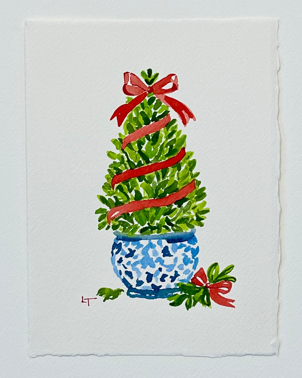 Full sheet of the 5x7 boxwood Christmas topiary original watercolor showing deckled edge watercolor paper, signed LT