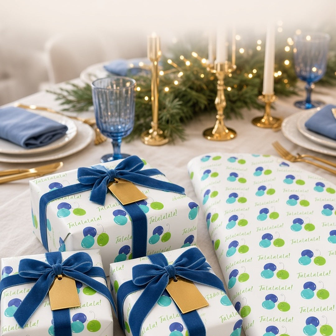 Fa La La blue and lime ornament Christmas wrapping paper on gifts with blue velvet ribbon