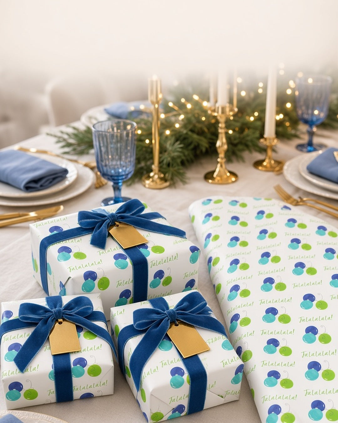 Fa La La blue and lime ornament Christmas wrapping paper on gifts with blue velvet ribbon