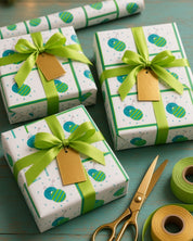 Teal and lime ornament Christmas wrapping paper on gifts with lime ribbon and gold tags