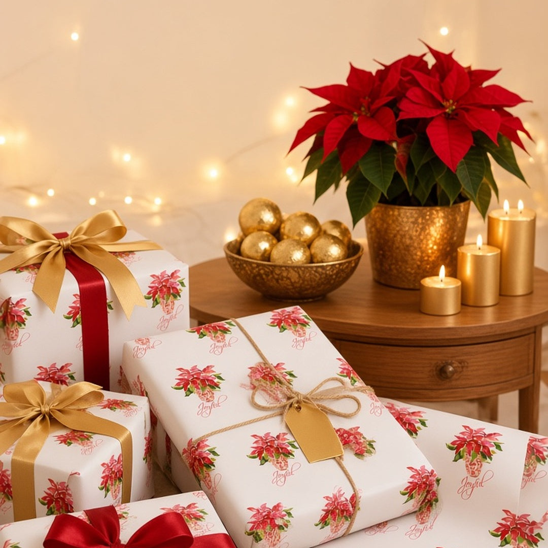 Red poinsettia Christmas wrapping paper on gifts with gold and red ribbon