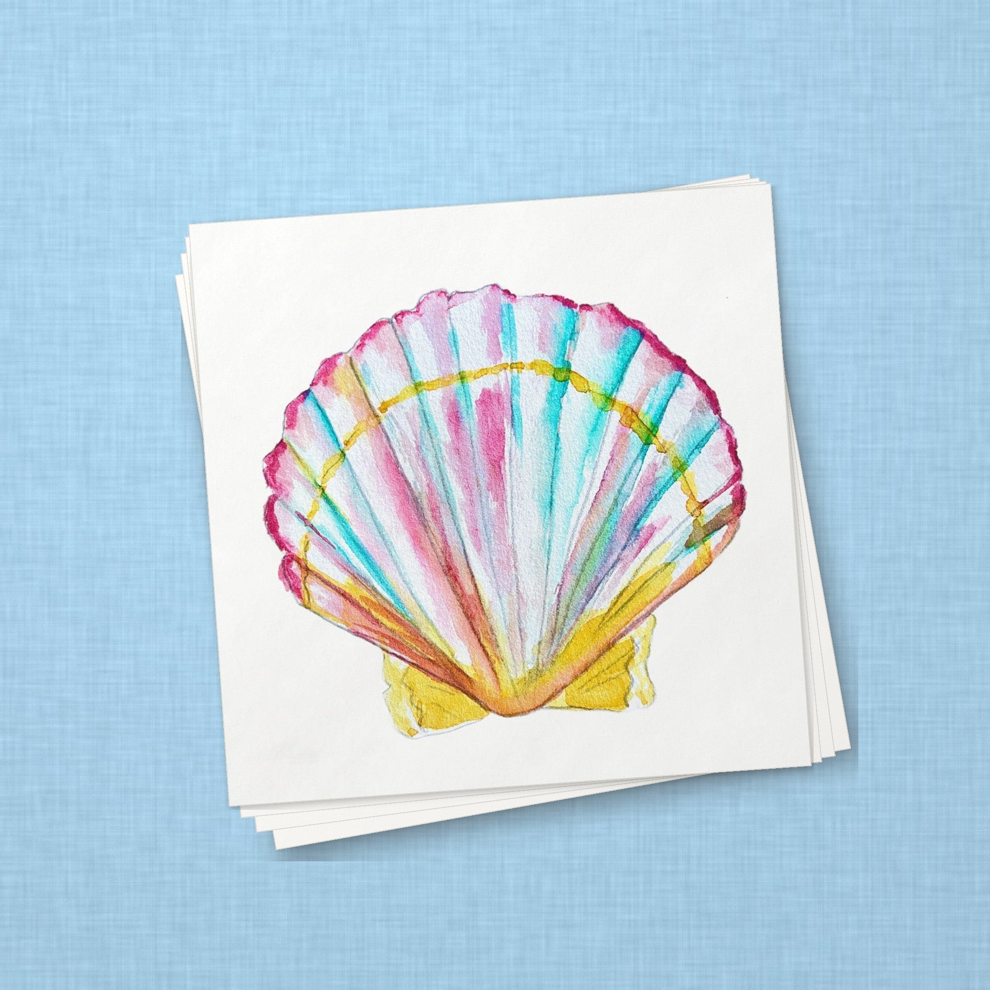 Scallop Shell Cocktail Napkins | Coastal Watercolor Paper Napkins – stack of cocktail napkins on sky blue linen